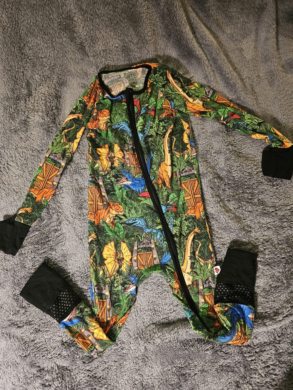 Green Dinosaur Jungle Print Footie Pajamas with Black Trim Size 18 To 24 Months
